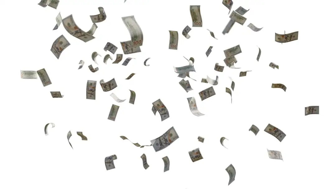 Dossiers immobiliers et maquette de maison examinés sur le bureau d’un notaire lors d’une vente.